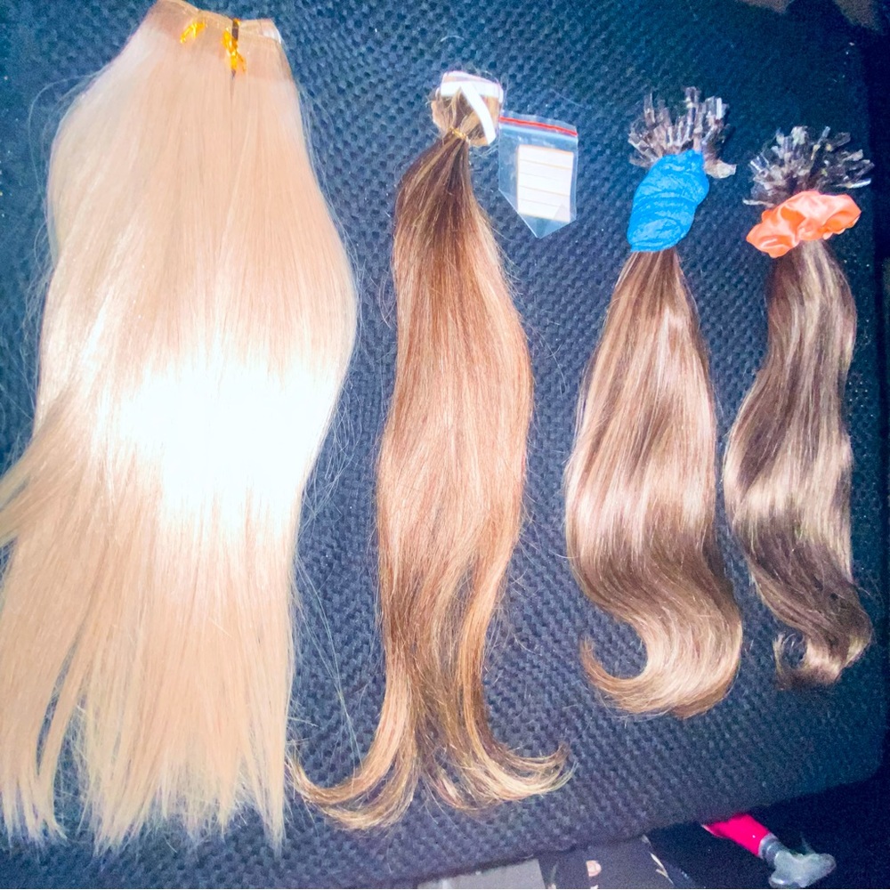 Four bundles of brand new 18” & 20” human hair extensions